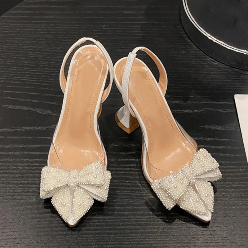 Liyke Fashion Design White Pearl Bowknot Women Pumps Sexy Pointed Toe High Heels Wedding Prom Shoe PVC Transparent Sandal Female